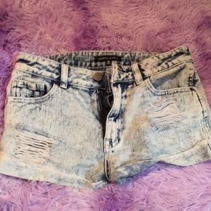 light blue Jean shorts with rips